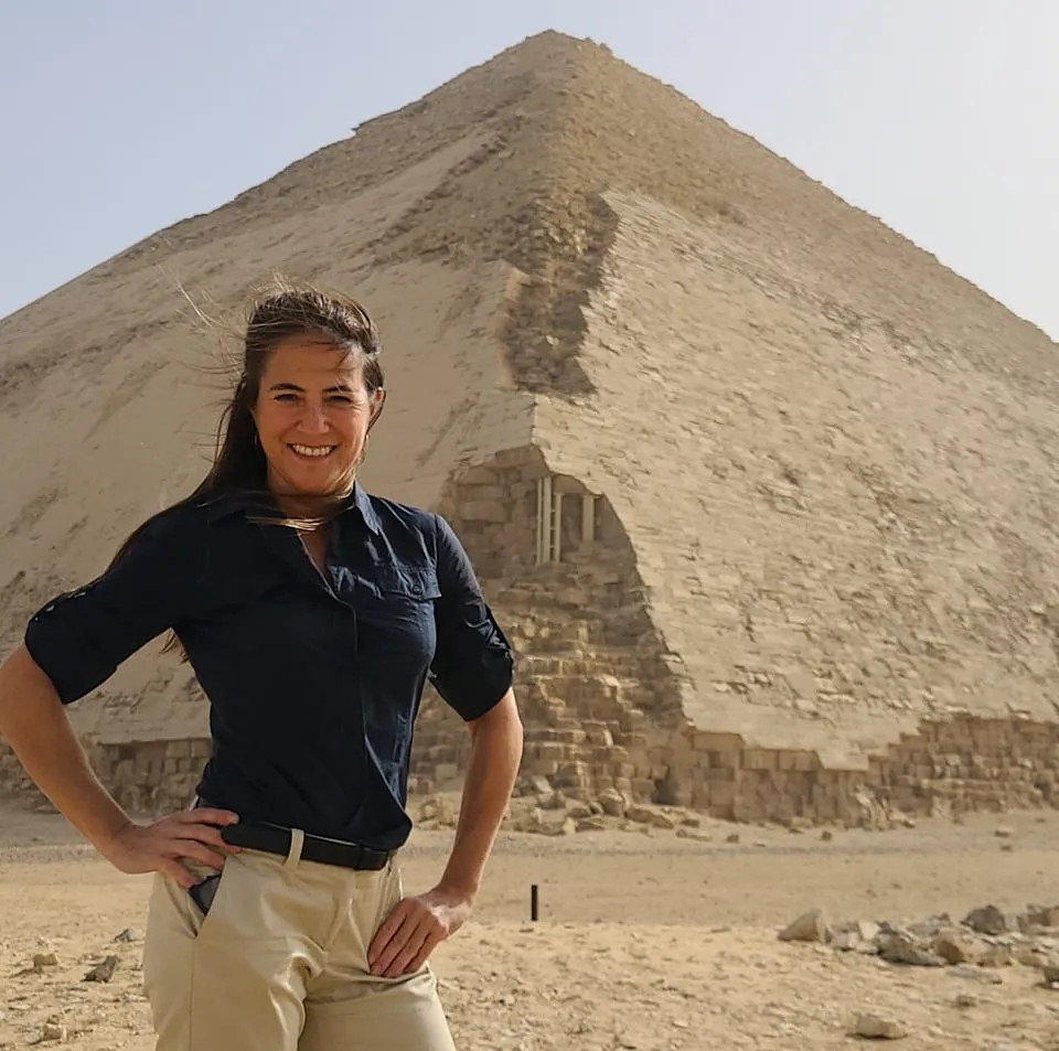 Woman standing in front of the Bent Pyramid at Dahshur