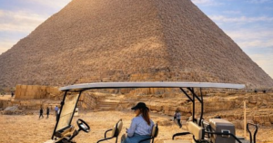 Golf cart parked near Giza Pyramids Egypt
