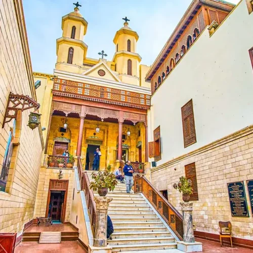Courtyard stairs and twin bell towers of the Hanging Church in Coptic Cairo