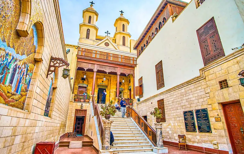 Courtyard stairs and twin bell towers of the Hanging Church in Coptic Cairo