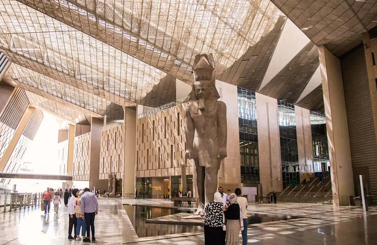Colossal statue of Ramses II in the Grand Hall of the Grand Egyptian Museum