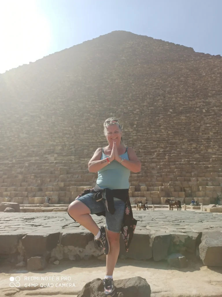 Traveler in front of the casing stones of a Giza pyramid