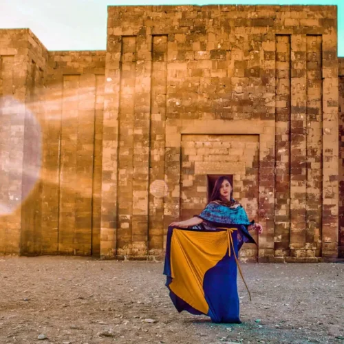 Traveler in front of the enclosure wall of the Step Pyramid at Saqqara
