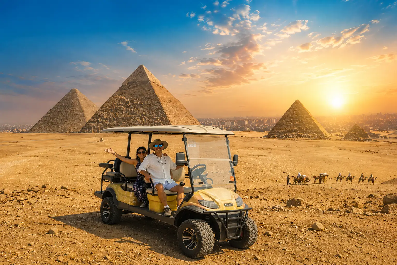 Couple riding a private golf cart at the Giza pyramids at sunset, camels in the distance