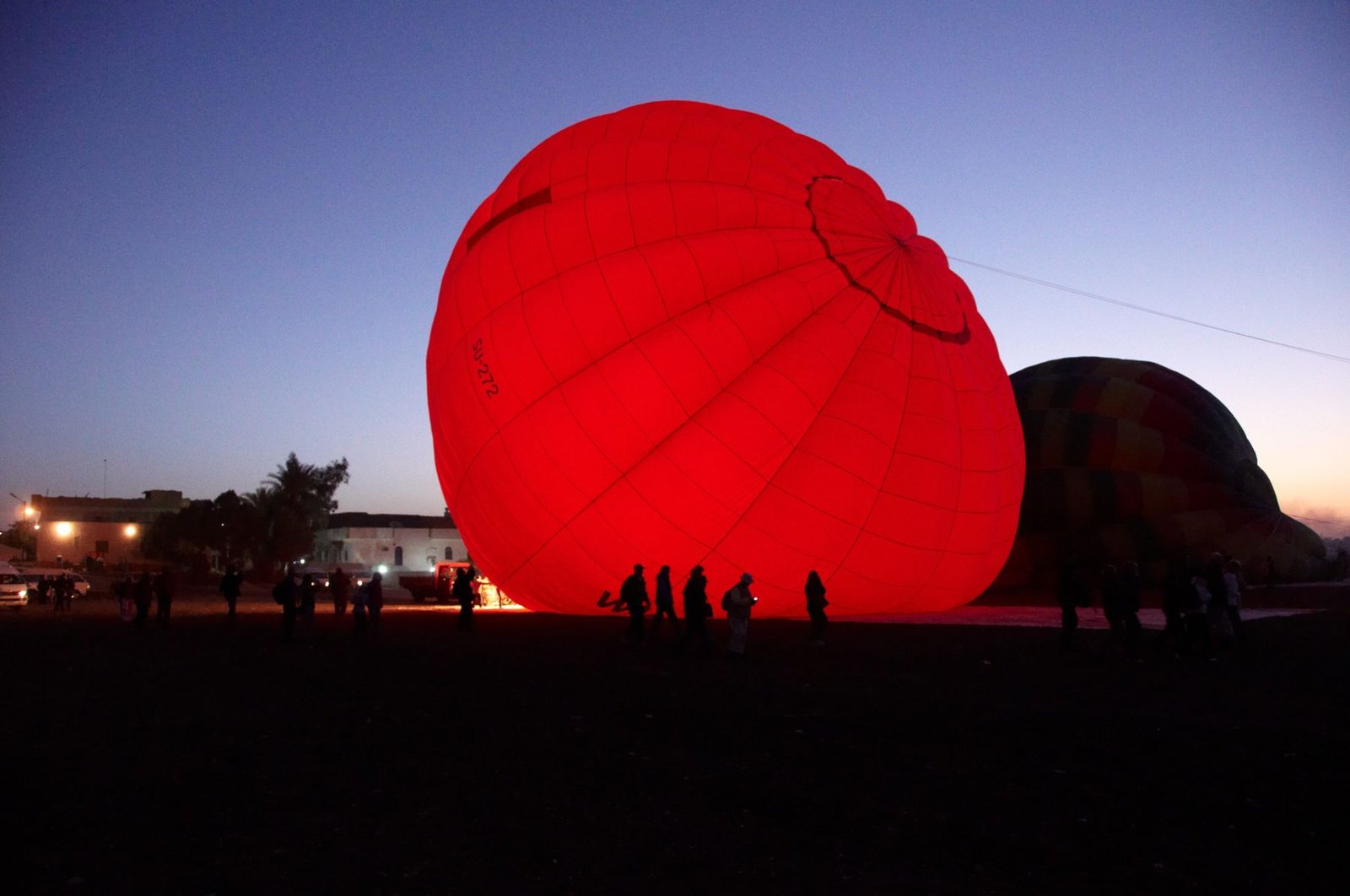 Inflating hot air balloon near Luxor, Egypt